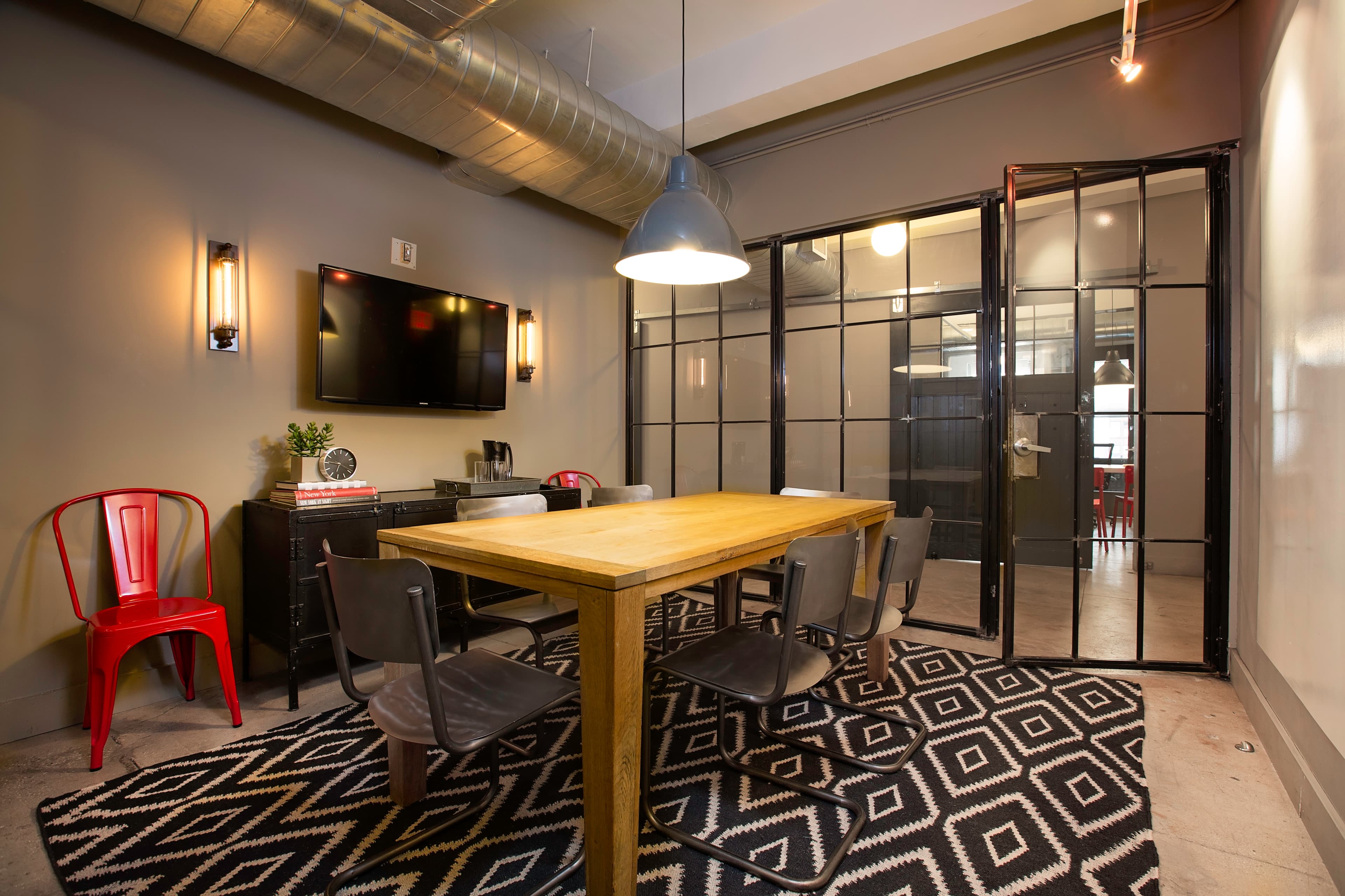 Cozy Conference Room with TV – Floor 7